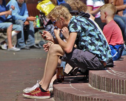 Parents And Gadgets: Is Giving Your Child A Mobile Phone A Good Idea?